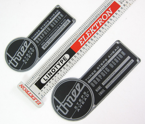 Three Steps Ahead letterpress business cards alongside Linotype ruler.